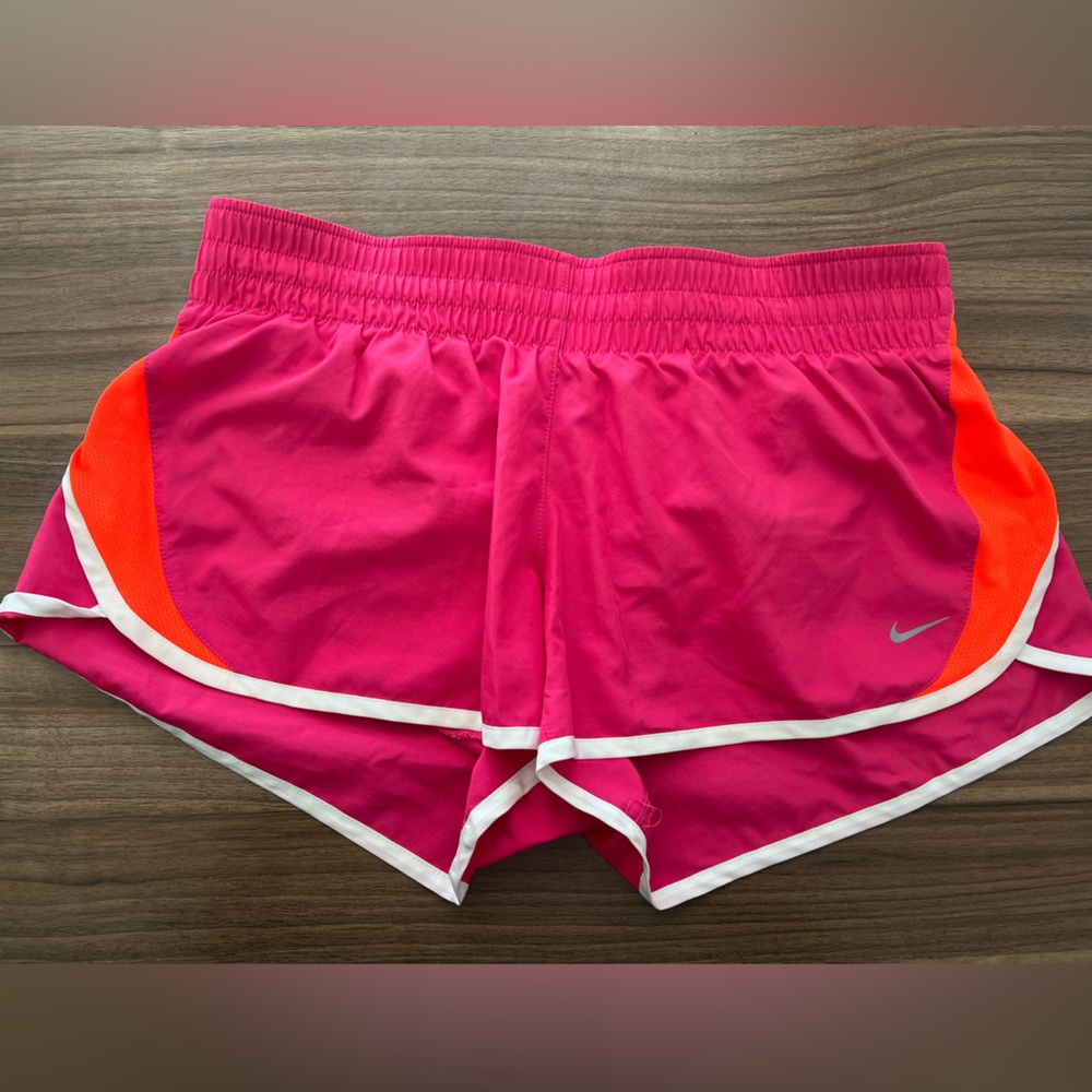 Like new - Nike women’s Dri Fit running short. Size L